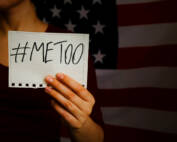 Woman holding a #metoo sign