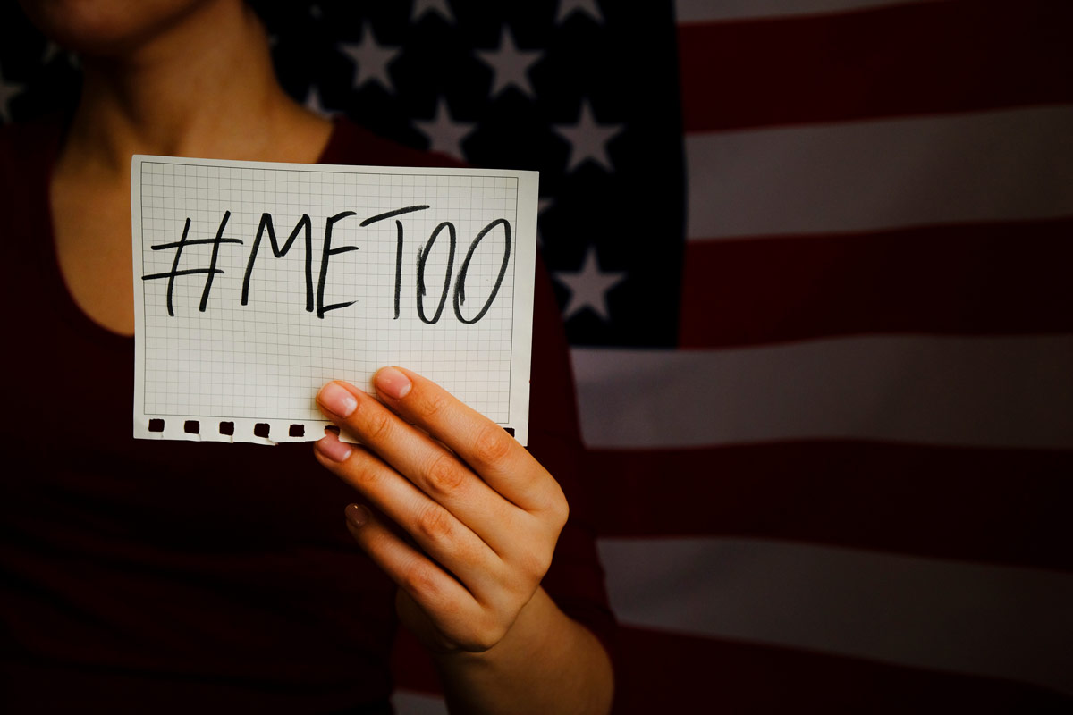 Woman holding a #metoo sign